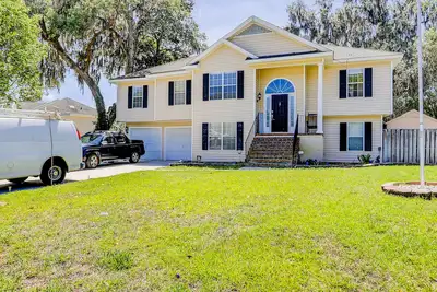 Image de Lovely waterfront apartment on creek inlet with dock - dog-friendly