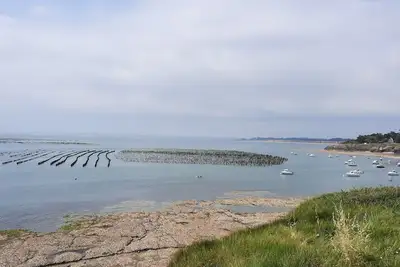 Image de Jolie maison bien équipée à 5mn à pieds de 2 belles plages et du centre nautique