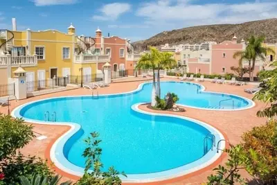 Image de Profitez de 1 Br Palm Mar à côté de la piscine