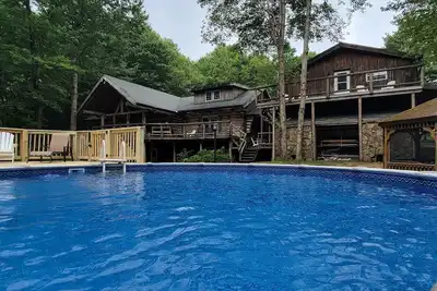 Image de Wingard Lodge | 7br, 5. 5ba, Pool, Hot Tub, Gorgeous Log Cabin with Amazing Views!