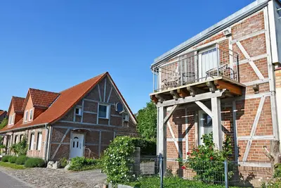 Image de Ferienwohnung mit Seeblick am Hafen in Seedorf - 10 Ferienwohnung m. Seeblick am Hafen in