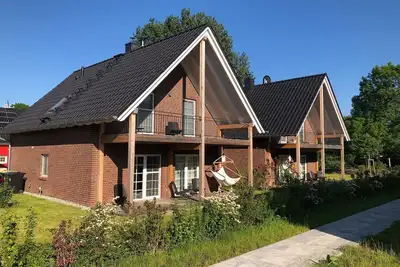Image de Maison de vacances \"Ferienhaus Familienkoje Rike\" avec jardin privé, sauna privé et Wi-Fi