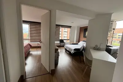 Image de Hermoso y Acogedor Apartamento en la 80