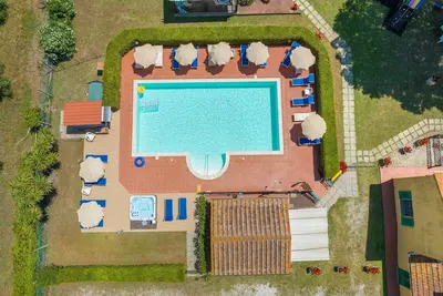 Image de Appartement \"Il Pino - Alloro\" avec piscine partagée et Wi-Fi