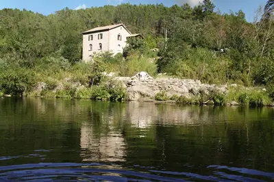 Image de Le moulin des salelles, 3 Gîtes en bord de rivière, plage privée baignade canoës