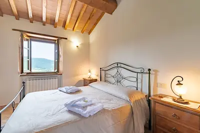 Image de Appartement \"Pugnano Alto - Castagna\" avec piscine partagée et Wi-Fi