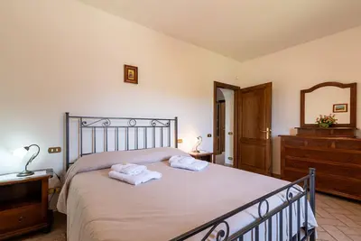 Image de Appartement 'Pugnano Alto - Porcino' avec piscine partagée, terrasse privée et Wi-Fi