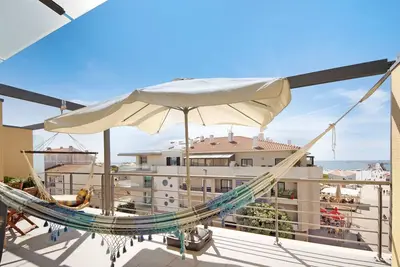 Image de Appartement 'Cantinho Da Praia Da Barra' avec vue sur la mer, piscine partagée et Wi-Fi