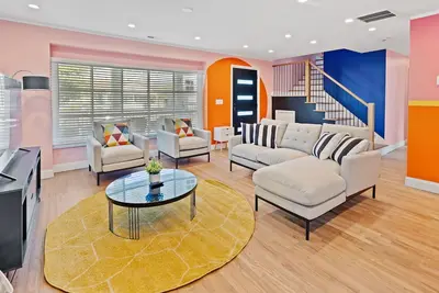 Image de Colorful Designer Home with Rec Room and Bar