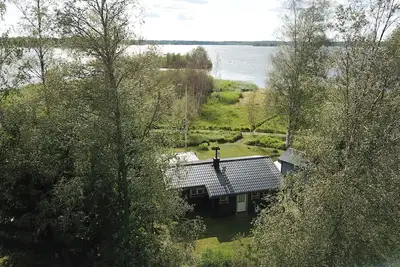 Image de Cozy holiday home by the lake with its own boat