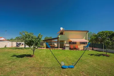 Maison de vacances avec jardin et air conditionné