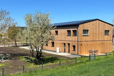 Image de Appartement de vacances 'Strandnahe Ferienwohnung 3' avec jardin et Wi-Fi