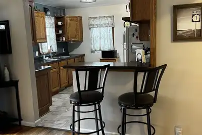 Image de Cozy/Modern Home close to pool/park, quick Uber to downtown or the Univeristy