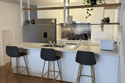 Image de Nice neat townhouse only 15mins from city and 15mins from beach!