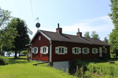 Image de Wonderful holiday home on a lake property in SmĂĄland