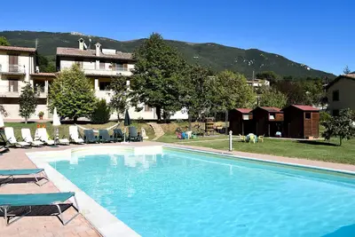 Image de Farmhouse in Assisi countryside with five renovated apartments and a swimming pool