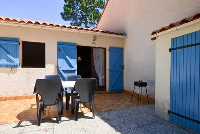 Image de Maison T2 Bis avec Terrasse Privative, proche plage et commerces - La Palmyre