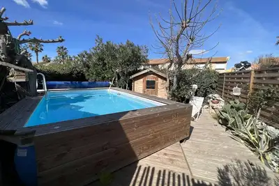 Image de Maison avec Piscine Privée, Proche Plage et Commerces, Jardin et Terrasse, 6 Pers