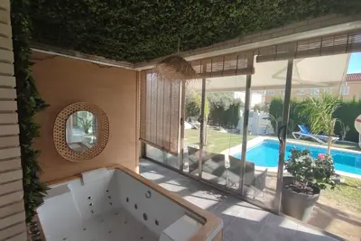 Tropical villa with Spa, private pool and beach at 3 minutes walking distance.