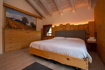 Appartement 'Chalet Galli Trilocale' avec vue sur la montagne, jardin partagé et Wi-Fi