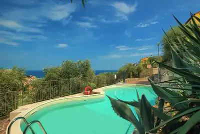 Image de House with sea view, private patio, A\/C, parking space and wi-fi