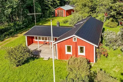 Image de Maison de vacances pour 4 a Askersund-By Traum