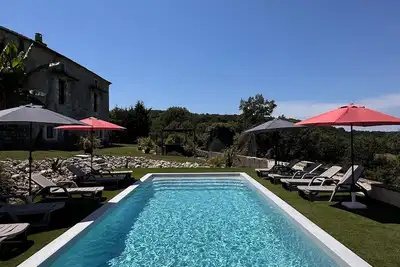 Image de Gîtes le Founil des Moines »Le Chai »espace piscine et spa naturiste