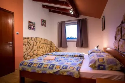 Image de Appartement de deux chambres avec la terrasse Lopar, Rab (A-20749-c)