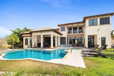 Massive pool villa with golf course and ocean views