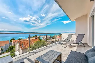 Image de Appartement de vacances avec machine à laver et près de la plage
