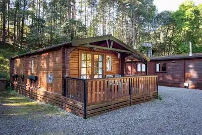 Image de Twa Hoots Lodge - a lodge that sleeps 4 guests in 2 bedrooms