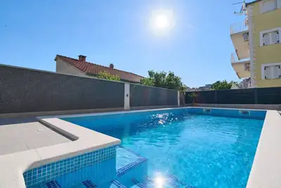 Image de M Charming apartment with shared pool