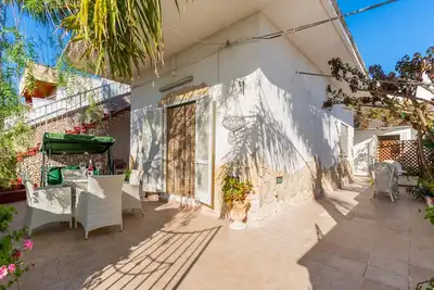 Image de Villa 'Villetta A Torre Lapillo' avec vue sur la mer, terrasse partagée et climatisation