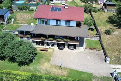 Image de Appartement au Wörthersee avec piscine