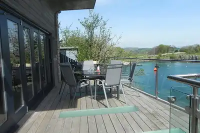 Image de Contemporary, grass roofed stone house, HotTub, sleeps 6, children, pets welcome