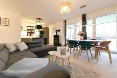 Image de Apartment 0/4 with sauna, fireplace, terrace incl. utilities - Apartmenthaus ScharmĂĽtzelsee