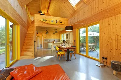 Image de Exclusive, 100 square meter solid wood vacation home for 4 people.