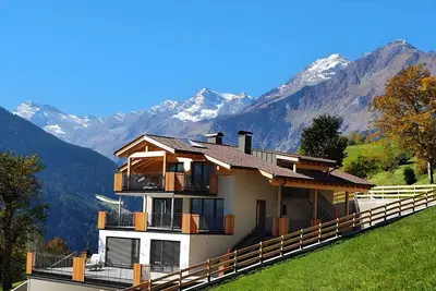 Image de \"Sunnseitn Lodge Apt Moutainsuite\" avec jacuzzi chauffé, sauna infrarouge, terrasse panoramique