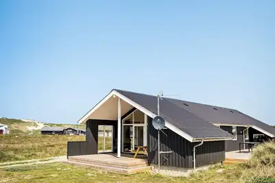 Image de Maison de vacances pour 8 a Harboøre-By Traum