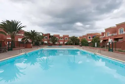 Maison de vacances avec piscine partagée