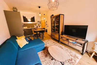 Image de Appartement neuf au centre des Gets avec balcon, sauna, parking et proximité pistes