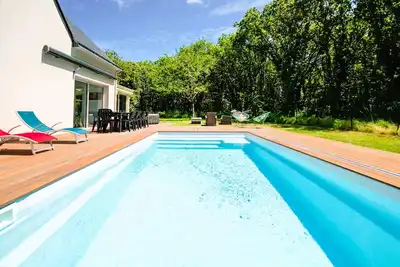 Image de Villa avec piscine privée, spa, plage et commerces à pied