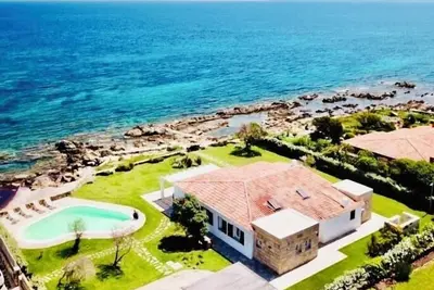 Beachfront villa with pool