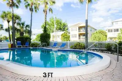 Image de Family-friendly Beachfront Condo with Beach Access and Pool! - Sunset Terrace 10