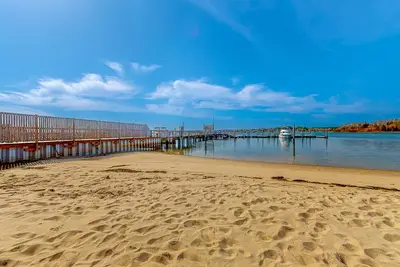 Image de 2-story home near downtown & beach with grill, outdoor shower, W\/D, & backyard