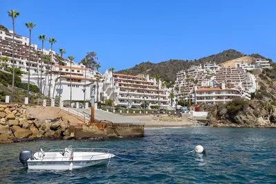 Hamilton Cove Condo with Golf Cart and Close to Beach. Only 24 Steps to Door.