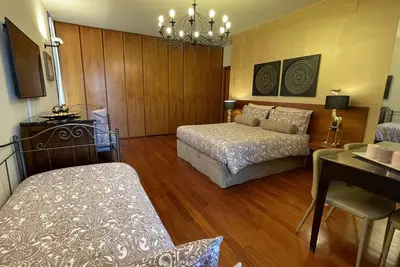 Villa with swimming pool surrounded by greenery in a panoramic location