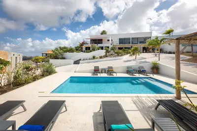 Image de Appartement Sasha - vue panoramique avec piscine