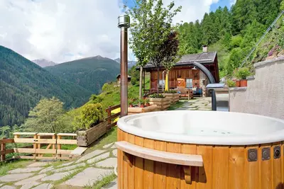 Image de Appartement 'Chalet Berghof Laret Arnica' avec vue montagne, sauna et Wi-Fi