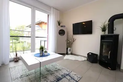 Image de Vacation apartment with beach chair on the beach directly behind the dyke